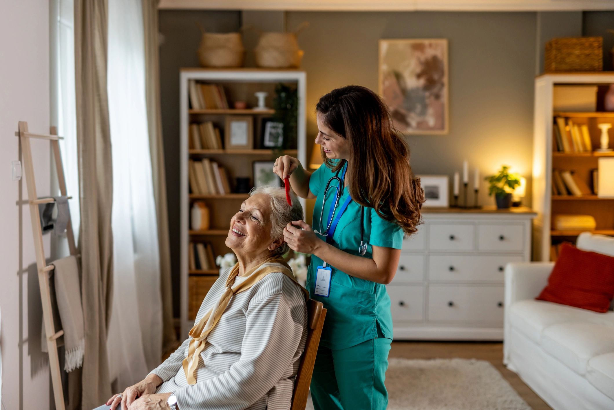 Support worker assisting a senior woman at home